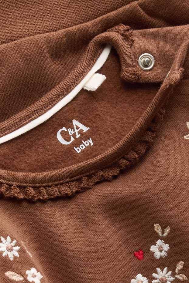 Baby: meisjes - Bloemetje - babysweatshirt - bruin