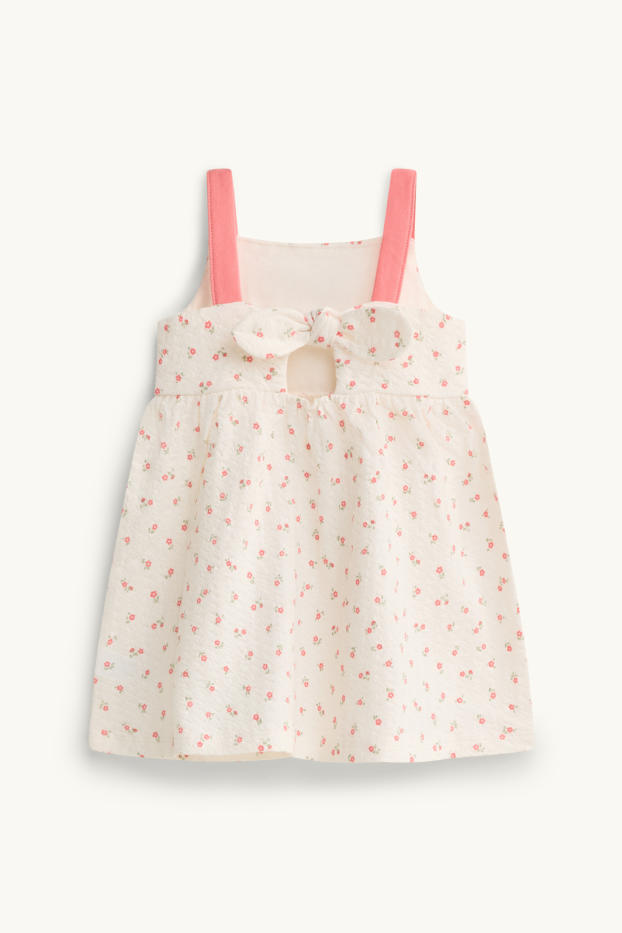 Baby: meisjes - Bloemetje - babyjurk - met structuur - wit