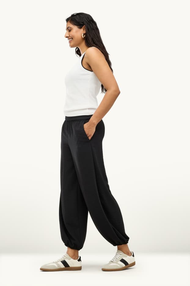 Dames - Harembroek - mid waist - balloon fit - zwart