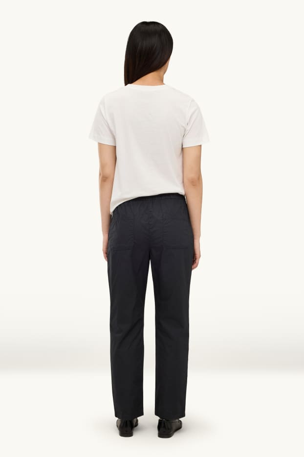 Femmes - Pantalon en toile - mid waist - tapered fit - noir