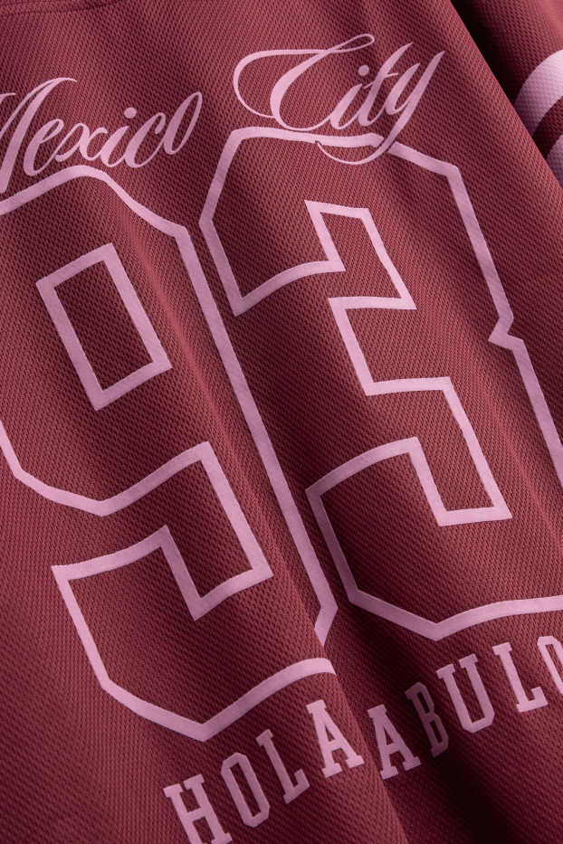 Kinder Mädchen - Kurzarmshirt mit V-Ausschnitt - Oversized - rosa / dunkelrot