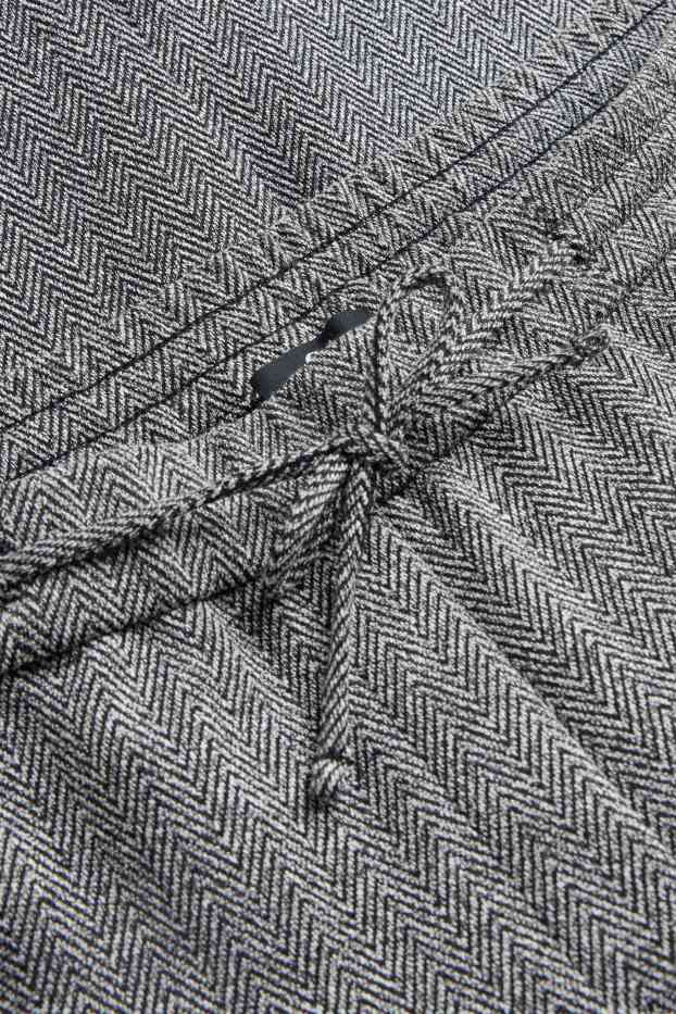 Dámské - Žerzejové kalhoty - mid waist - tapered fit - se vzorem - šedá-žíhaná