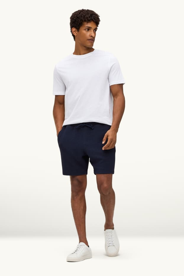 Hommes - Short en molleton - finition texturée - bleu foncé