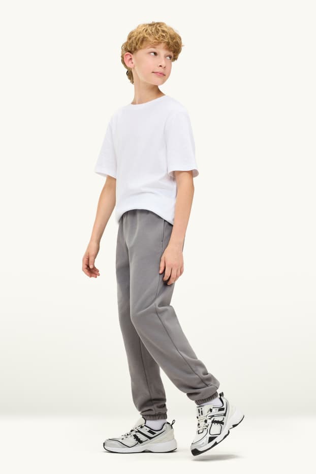 Kinderen: jongens - Set van 2 - joggingbroek - zwart / grijs