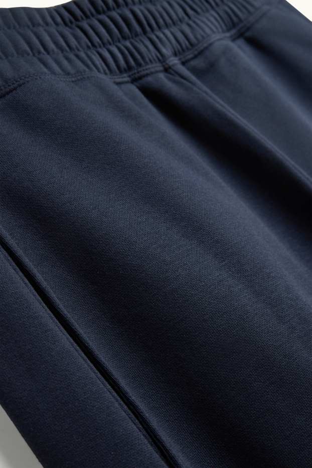 Dona - Pantalons de xandall - blau fosc