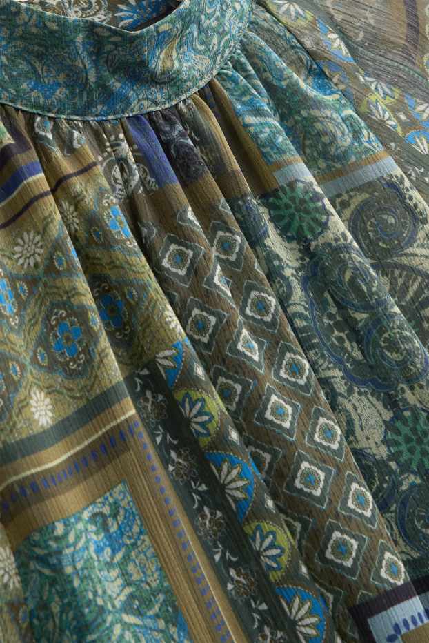 Dona - Brusa de xifó - estampada - verd fosc