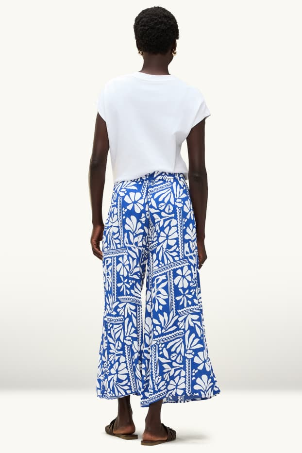 Women - Cloth trousers - mid-rise waist - - palazzo - patterned - blue / white