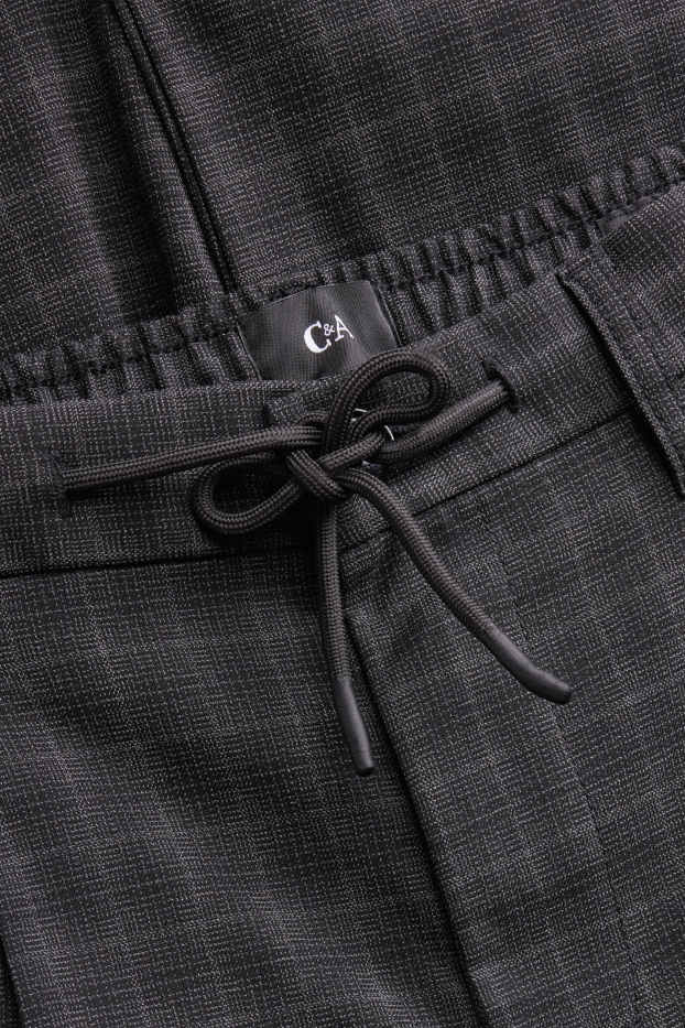 Hommes - Chino - tapered fit - à carreaux - noir / gris