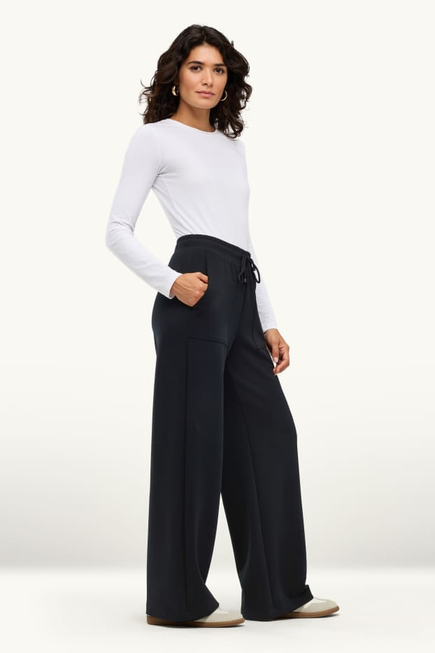 Dona - Pantalons de xandall - negre