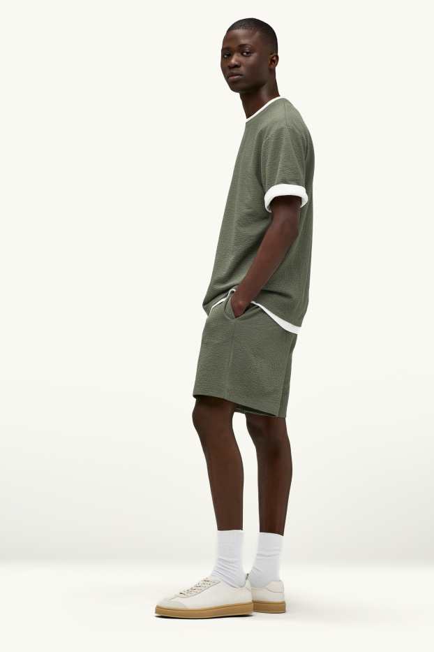 Hommes - Short en molleton - finition texturée - vert