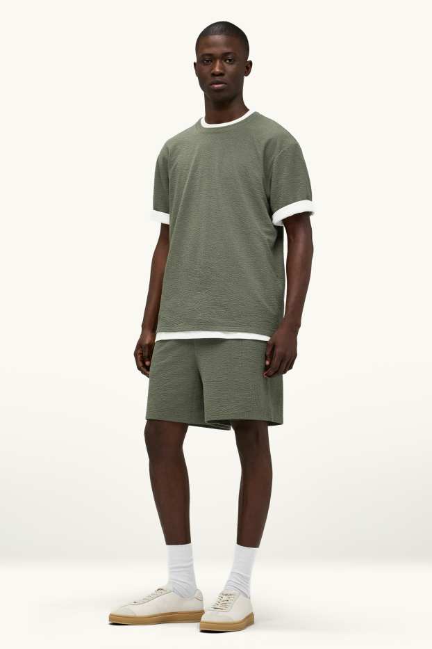 Hommes - Short en molleton - finition texturée - vert