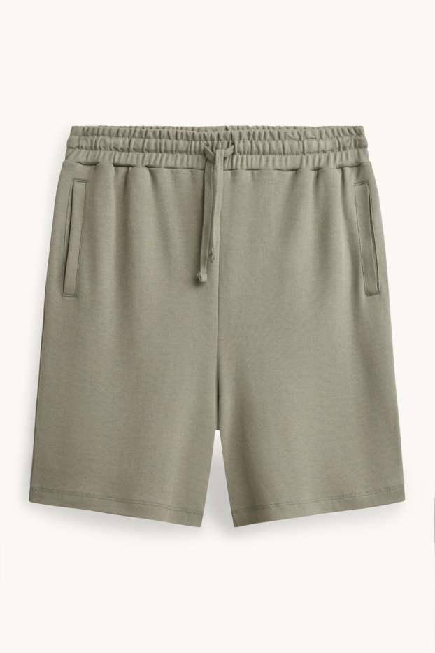 Bărbați - Pantaloni scurți de trening - verde deschis