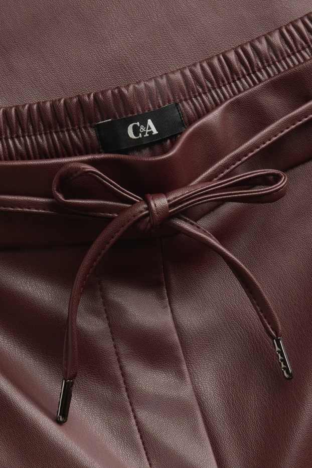 Dona - Pantalons de tela - mid waist - straight leg - pell sintètica - bordeus