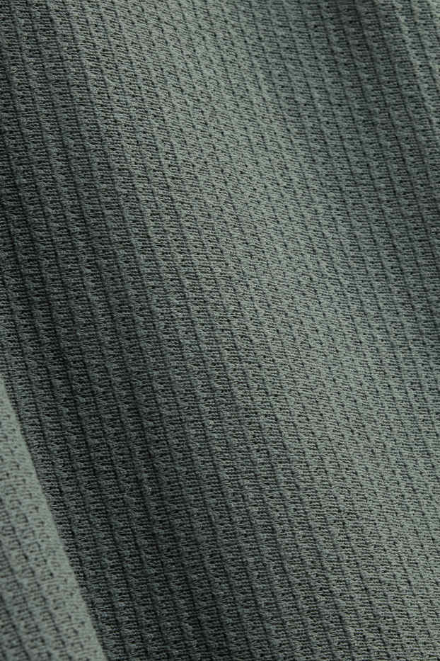 Heren - Gebreid poloshirt - relaxed fit - met structuur - groen