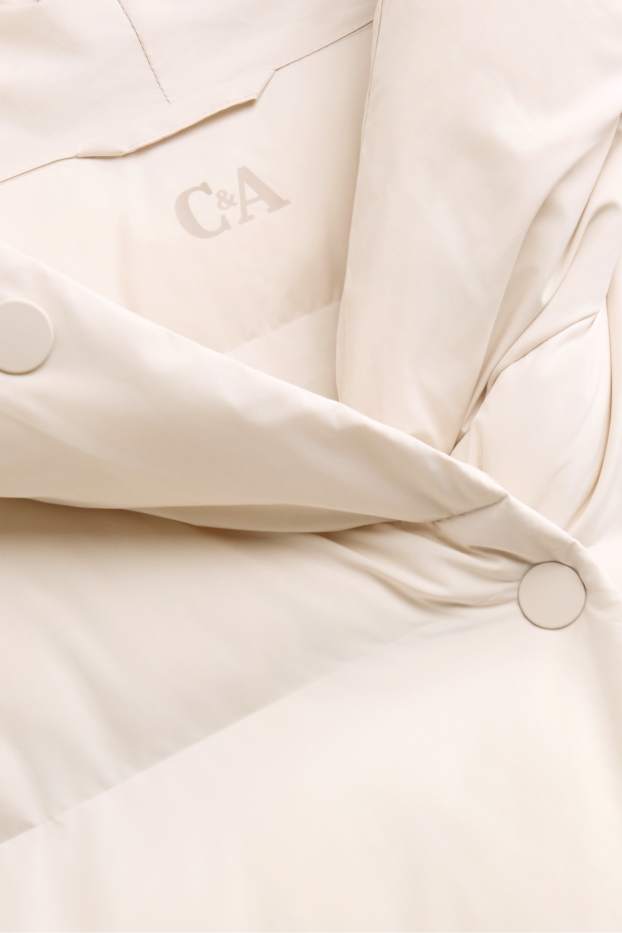 Dona - Abric embuatat amb caputxa - repel·lent a l’aigua - crema