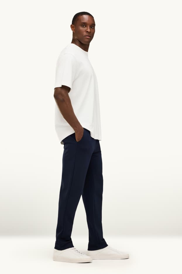 Uomo - Pantaloni sportivi - nero