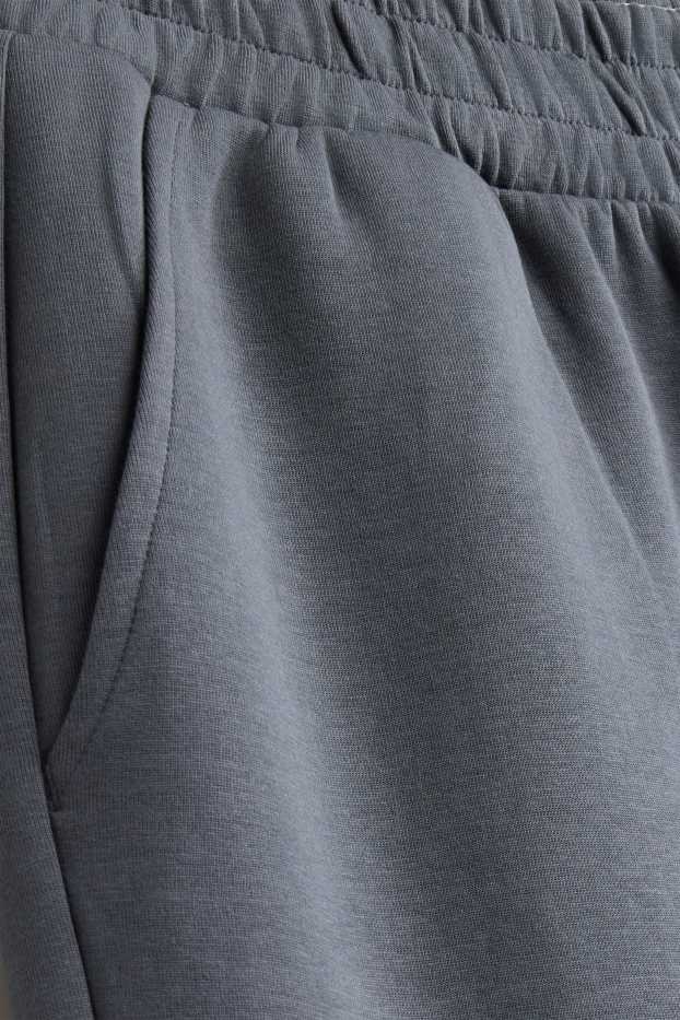 Uomo - Pantaloni sportivi - grigio