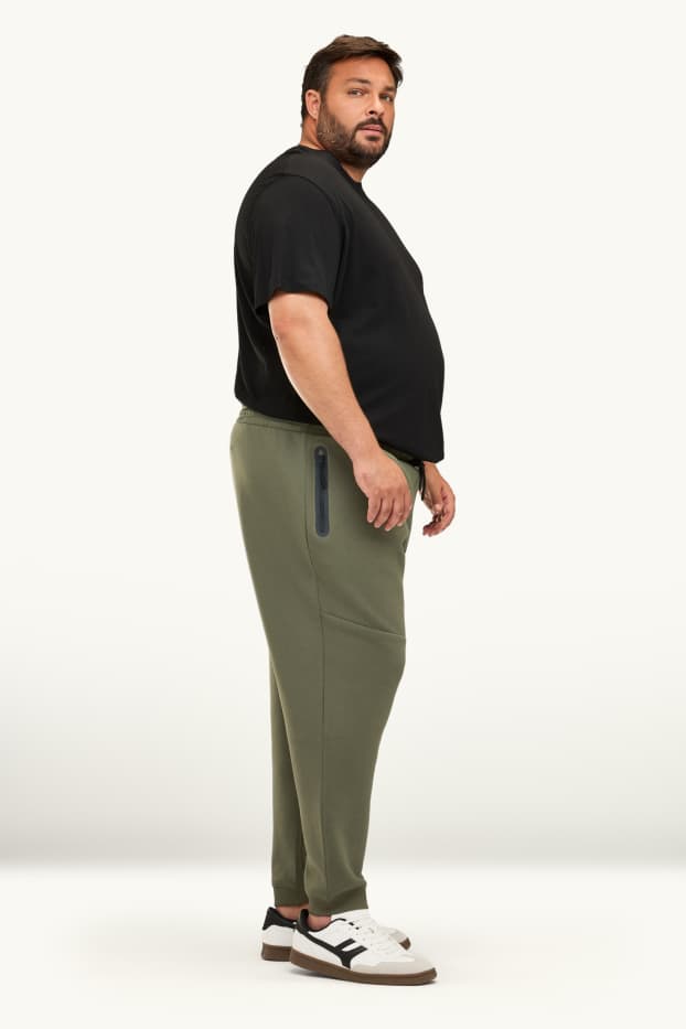 Bărbați - Pantaloni de trening - verde închis