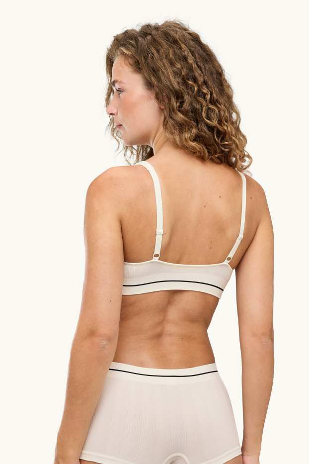 Femmes - Brassière - ampliforme - finition côtelée - seamless - blanc crème