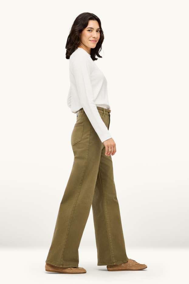 Femmes - Jean à jambe évasée avec ceinture - high waist - kaki