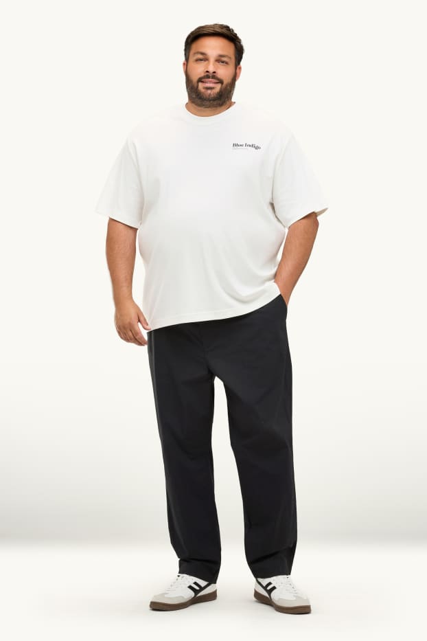 Hommes - Chino - tapered fit - noir