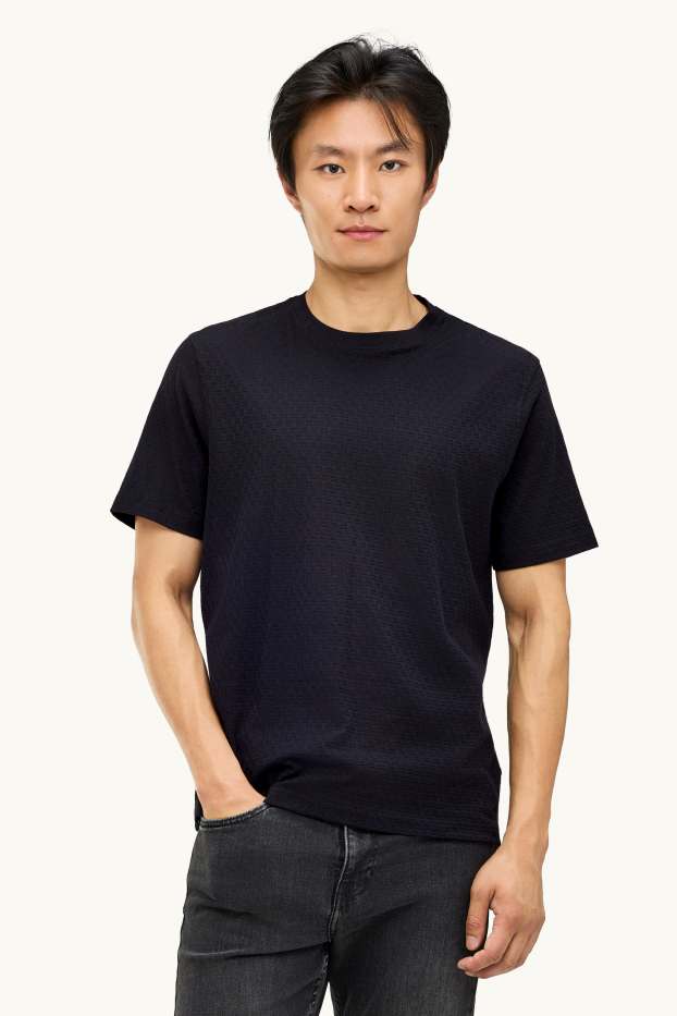 Uomo - T-shirt - regular fit - tessuto tramato - nero