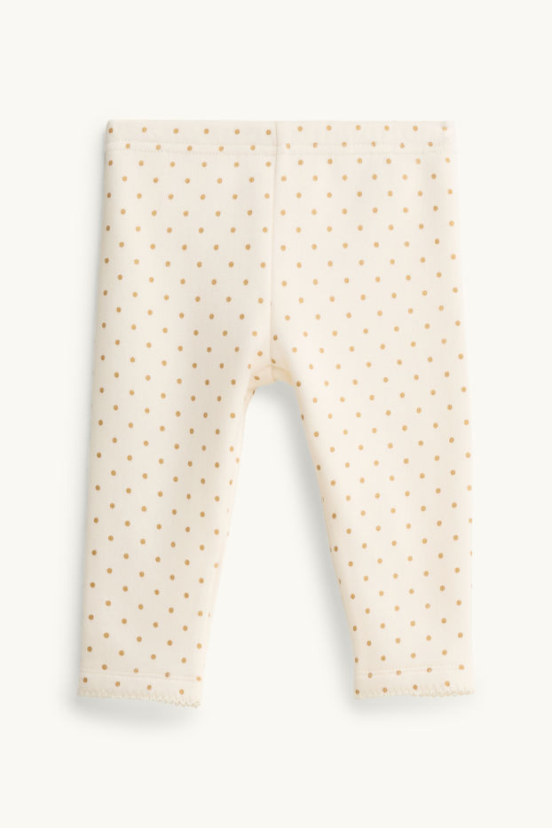 Baby: meisjes - Babylegging - gevoerd met pluche - gestippeld - crèmekleurig