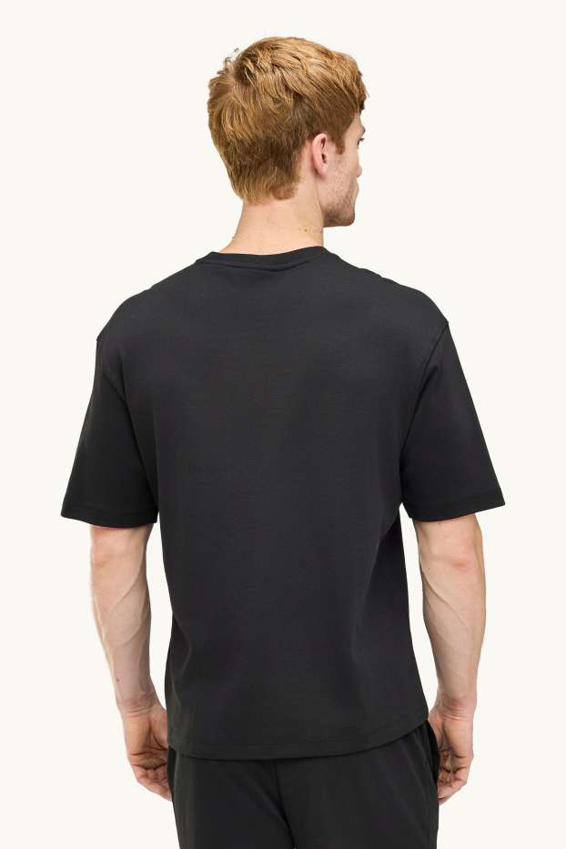 Hommes - T-shirt - relaxed fit - noir
