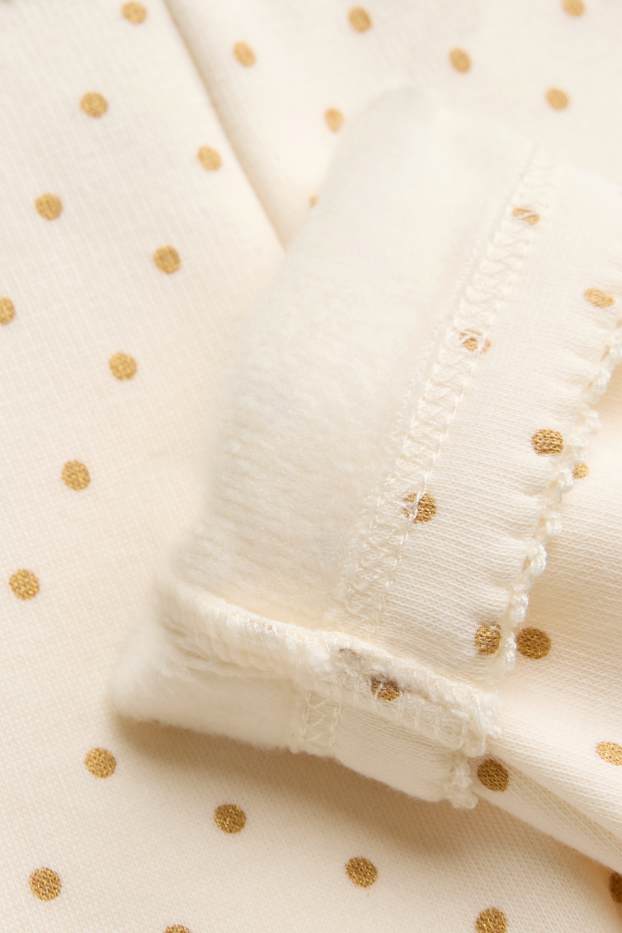 Baby: meisjes - Babylegging - gevoerd met pluche - gestippeld - crèmekleurig