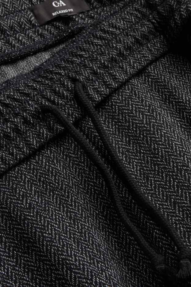 Hommes - Pantalon de jogging - à motif - gris foncé