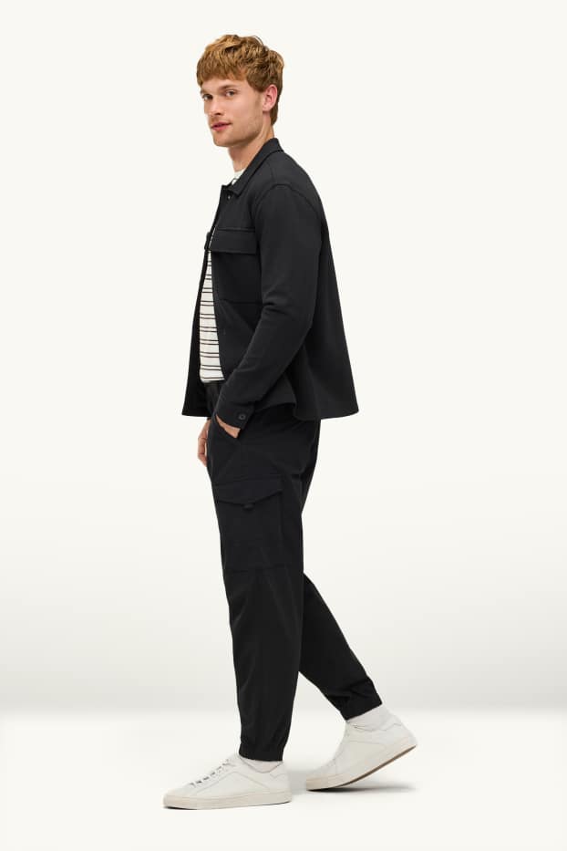 Hommes - Pantalon cargo - tapered fit - noir