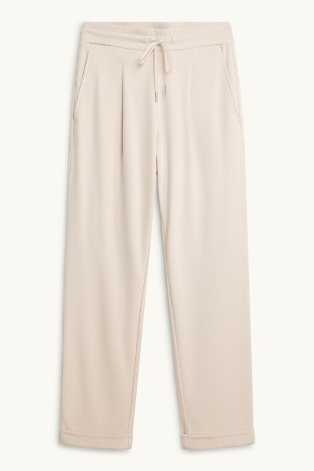 Dona - Pantalons de tela - mid waist - tapered fit - crema