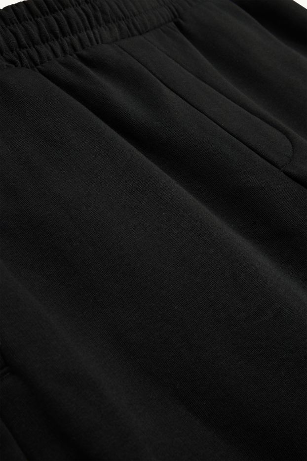 Uomo - Pantaloni sportivi - nero