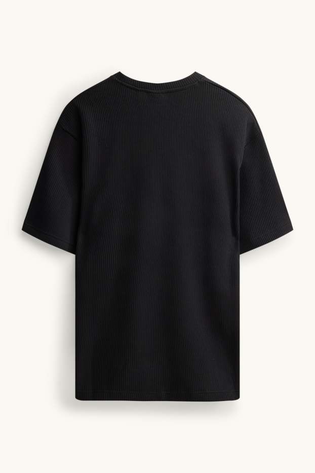 Mężczyźni - T-shirt - relaxed fit - w prążki - czarny