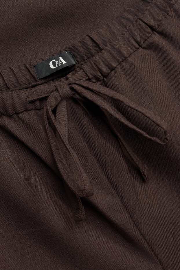 Dona - Pantalons de tela - mid waist - wide leg - marró fosc