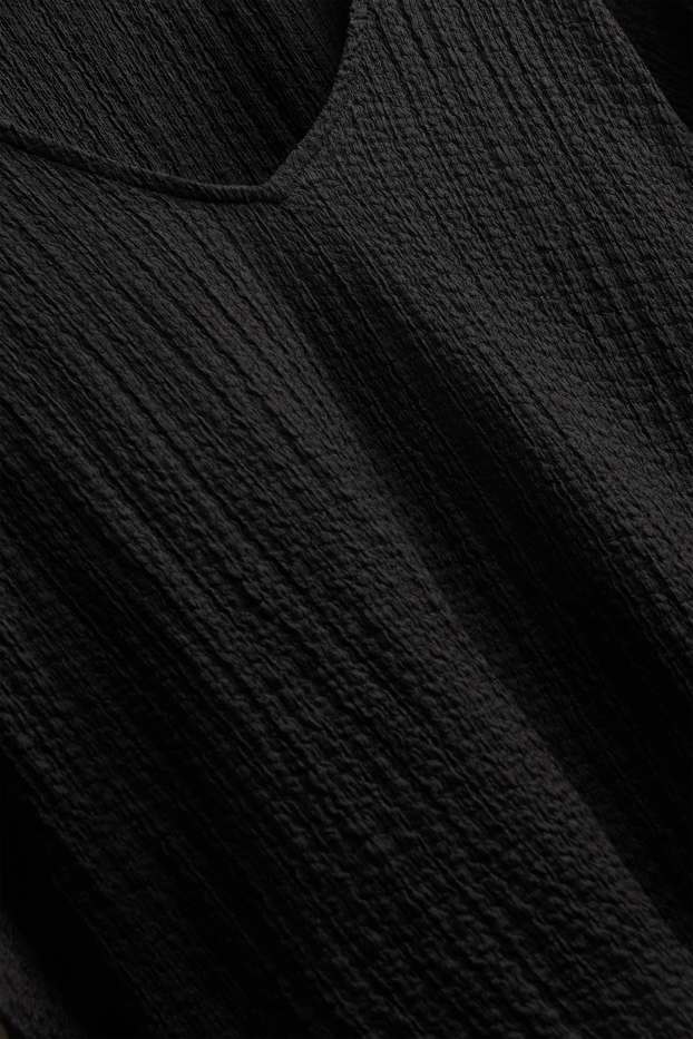 Damen - T-Shirt mit V-Ausschnitt - Regular Fit - schwarz