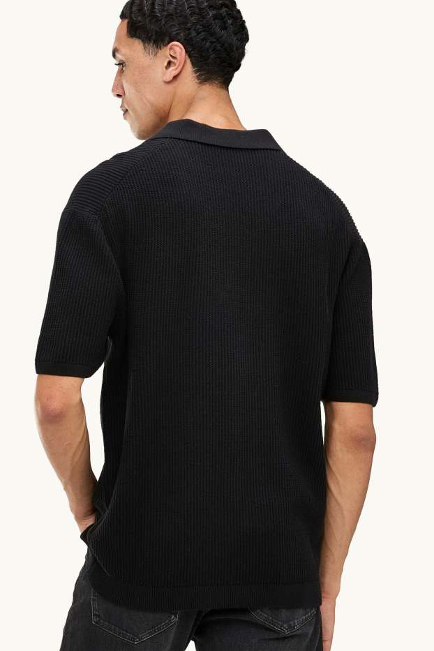 Hommes - Polo en maille - finition côtelée - noir