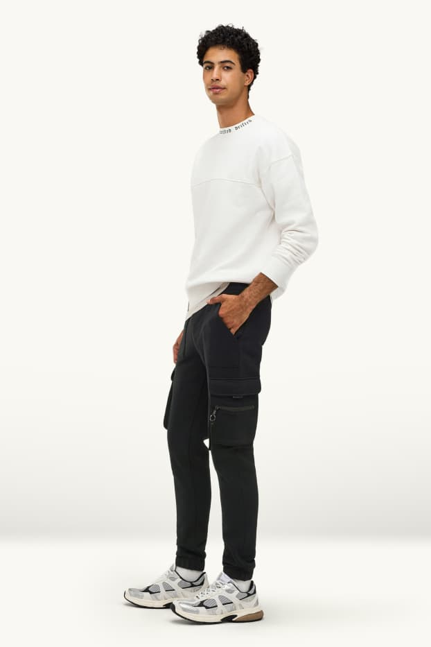 Bărbați - Pantaloni de trening cargo - negru