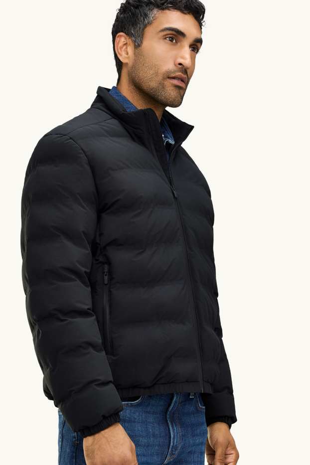 Home - Jaqueta embuatada tècnica - amb folre - impermeable - negre