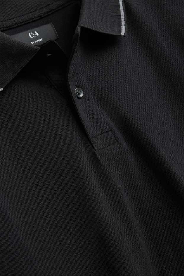 Hommes - Polo à manches longues - slim fit - noir