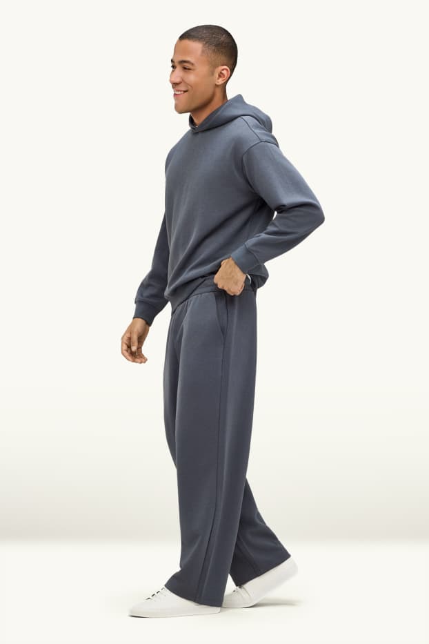 Uomo - Pantaloni sportivi - grigio