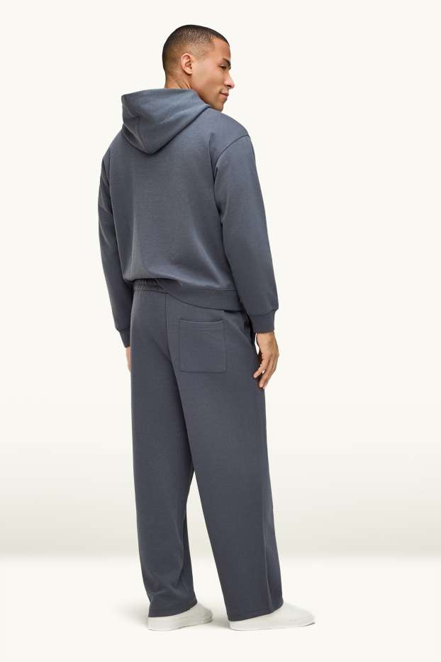 Uomo - Pantaloni sportivi - grigio