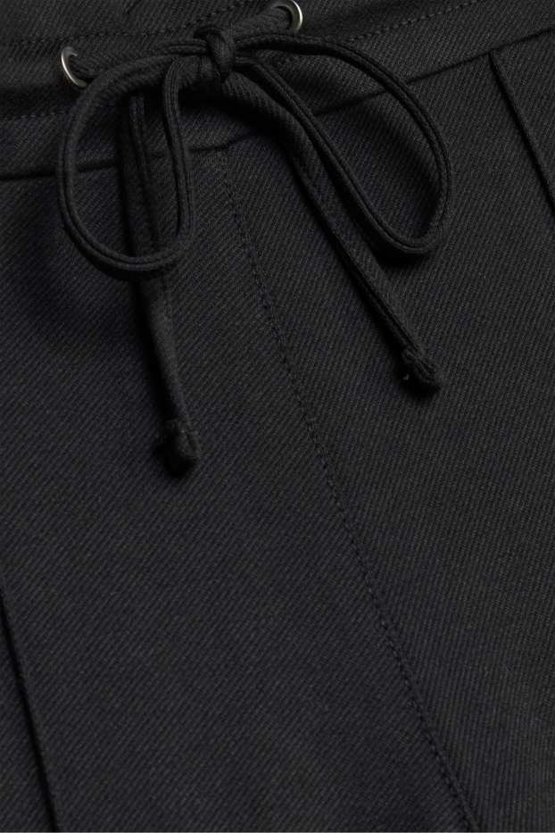 Dona - Pantalons de punt - mid waist - wide leg - negre