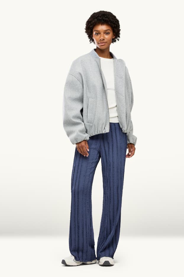 Femmes - Pantalon en jersey - mid waist - wide leg - finition texturée - bleu