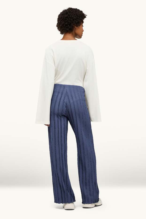 Femmes - Pantalon en jersey - mid waist - wide leg - finition texturée - bleu