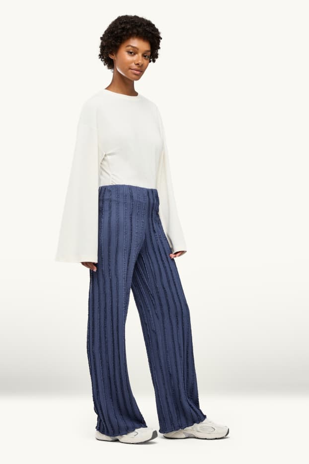 Femmes - Pantalon en jersey - mid waist - wide leg - finition texturée - bleu