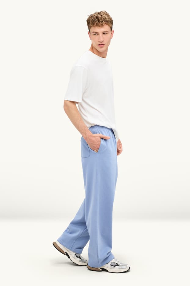Hommes - Pantalon de jogging - bleu clair