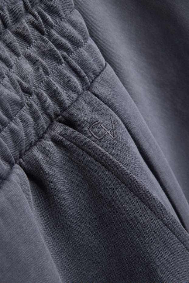 Uomo - Pantaloni sportivi - grigio