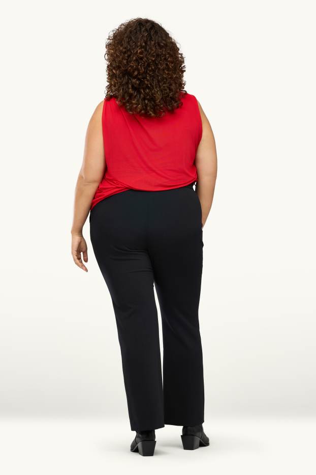 Donna - Pantaloni - vita media - flared - nero