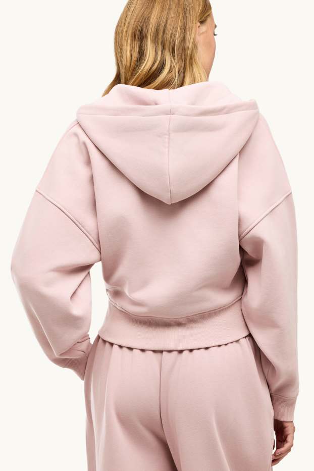 Dona - Dessuadora oberta amb caputxa - rosa pastel